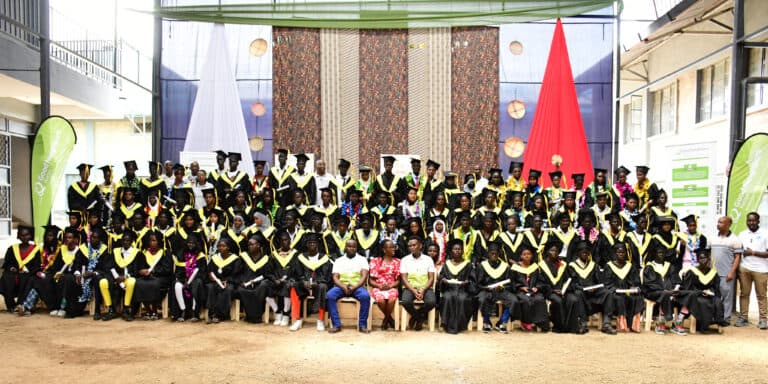 Graduates in caps and gowns at a Good Neighbors Kenya ceremony